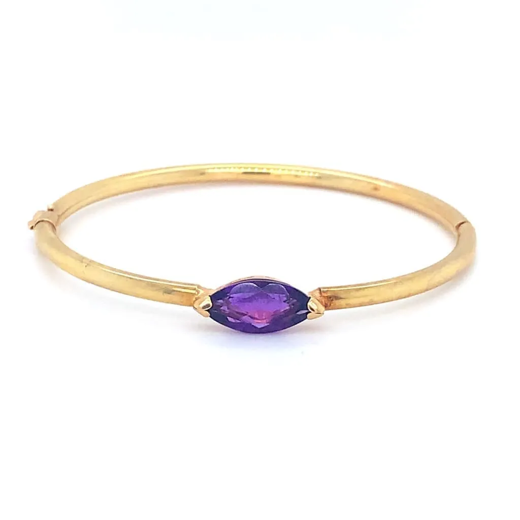 6.06CT AMETHYST BRACELET SET IN 14K YELLOW GOLD AT REGARD JEWELRY IN AUSTIN, TX.